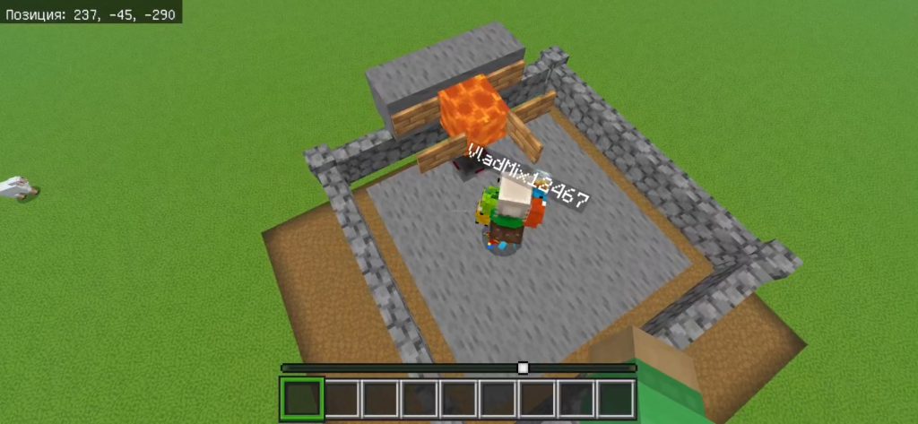 Установка лавы между табличками в автоматической ферме железа Minecraft